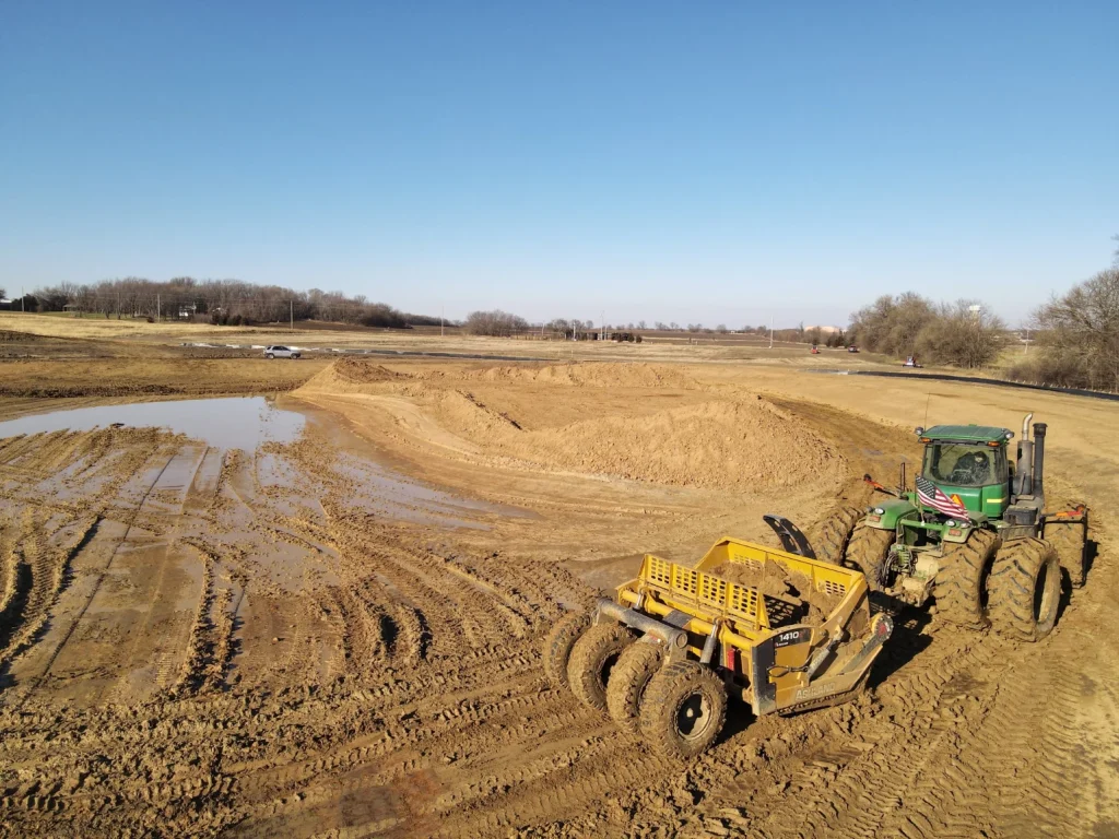 The process for how to dig a pond involves heavy earthmoving equipment