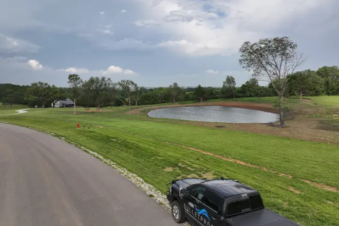 A beautiful pond that was installed by Bulletproof Pond and Lake