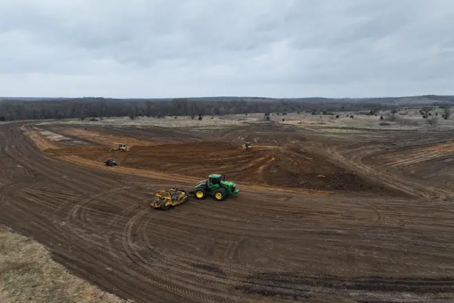 professional pond excavation uses scraper systems