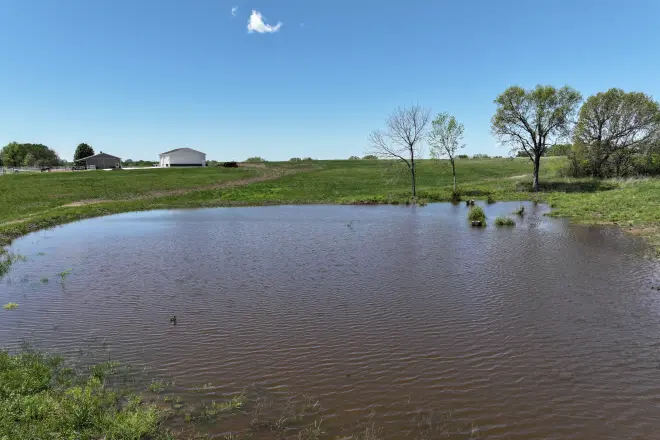 a peaceful pond that has filled with water