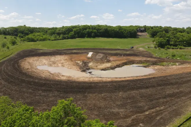 The permitting process for pond construction is a crucial step before a pond excavation