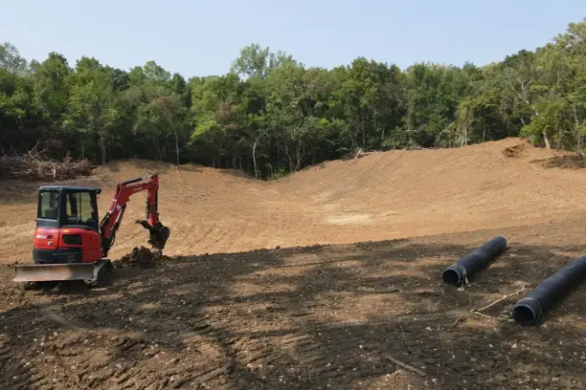 Rebuild pond dam work on Perry KS project - Bulletproof Pond and Lake pond dam being rebuilt