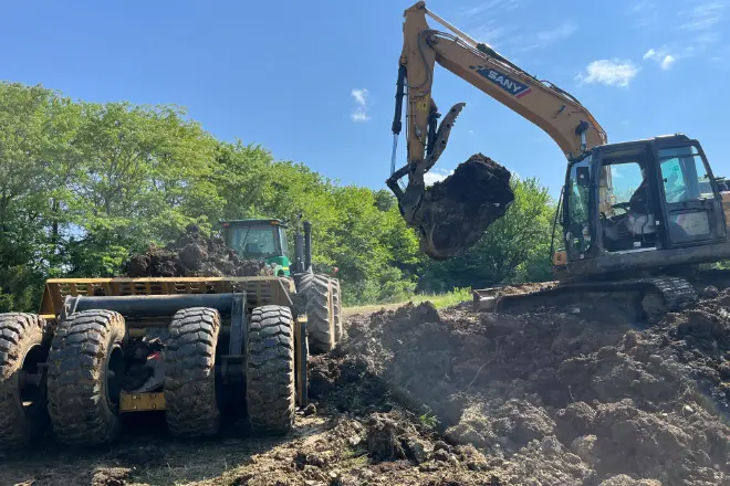 A muck out being done by Bulletproof Pond and Lake - Bulletproof Pond and Lake A muck out pond service being done by Bulletproof Pond and Lake