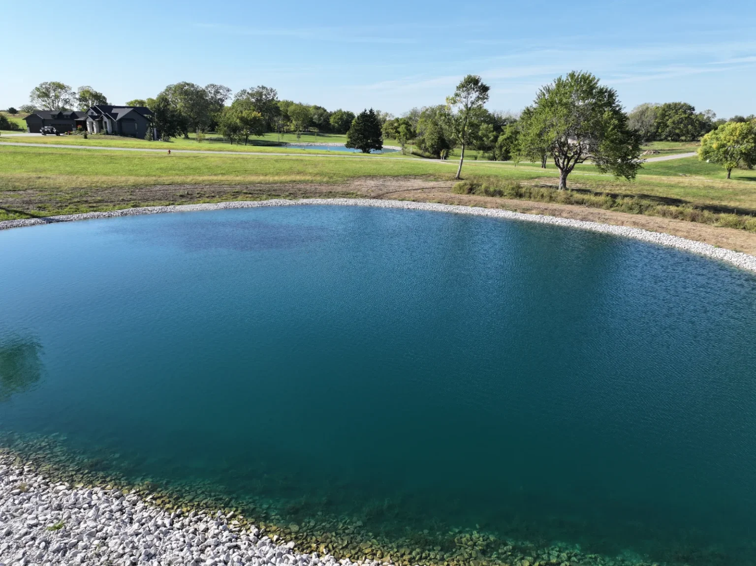 Acreage pond cleaning and dredging by Bulletproof Pond and Lake