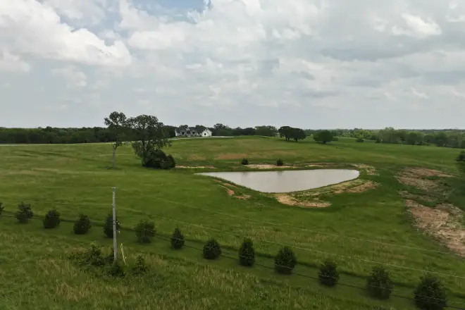 A pond constructed by Bulletproof Pond and Lake - what is a swale