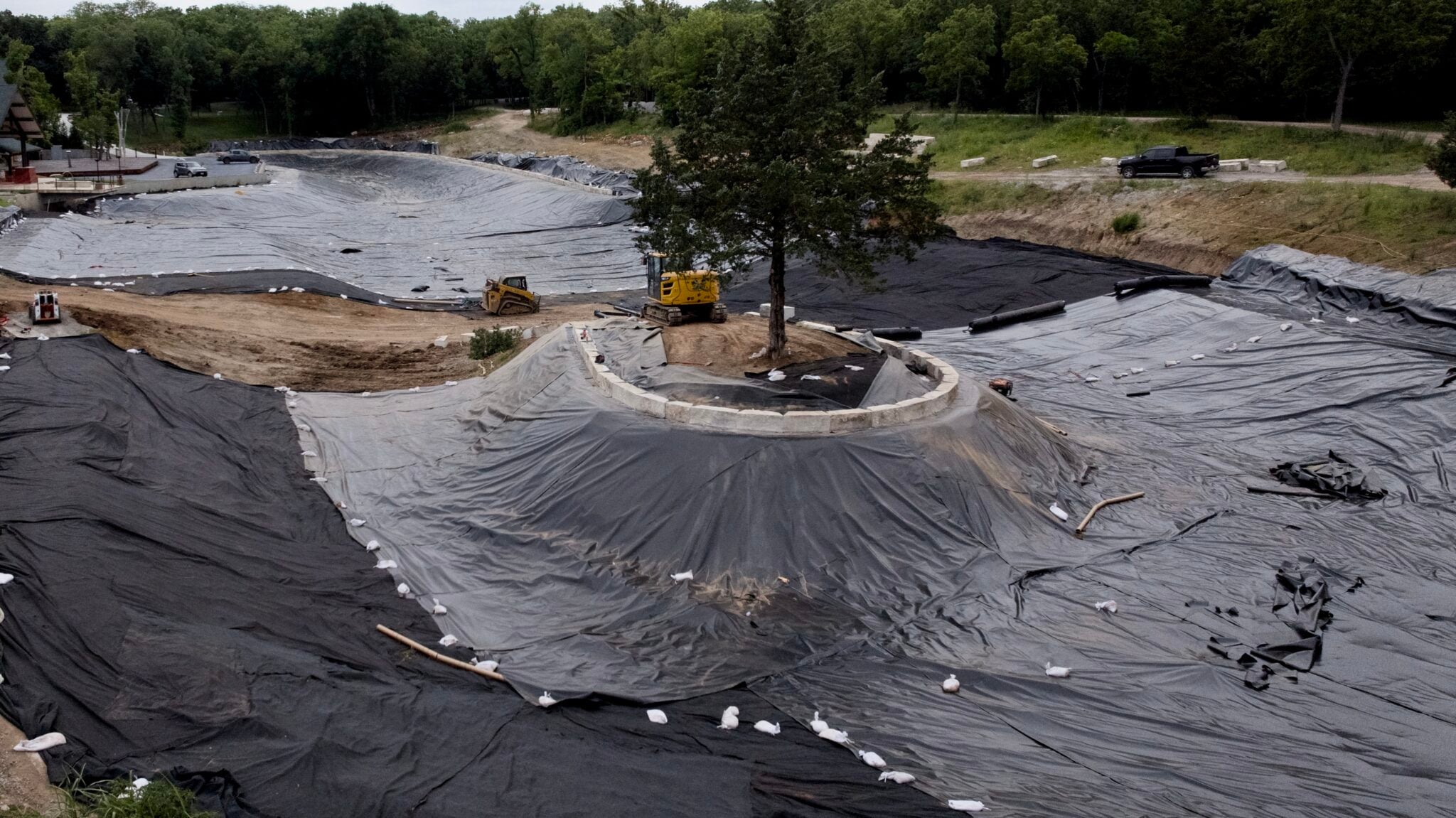 Luxury Estate Geosynthetic Liner Pond Installation near Kansas City, in Olathe Kansas. Completed by Bulletproof Pond and Lake