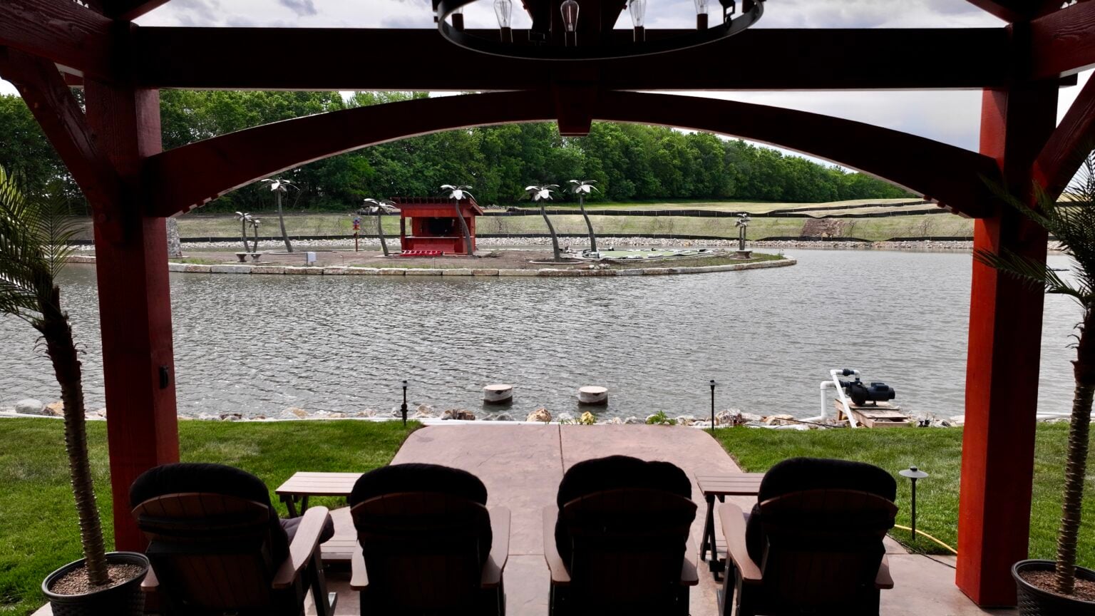 Margaritaville Inspired Luxury Entertainment and Fishing Pond Designed and Built by Bulletproof Pond and Lake