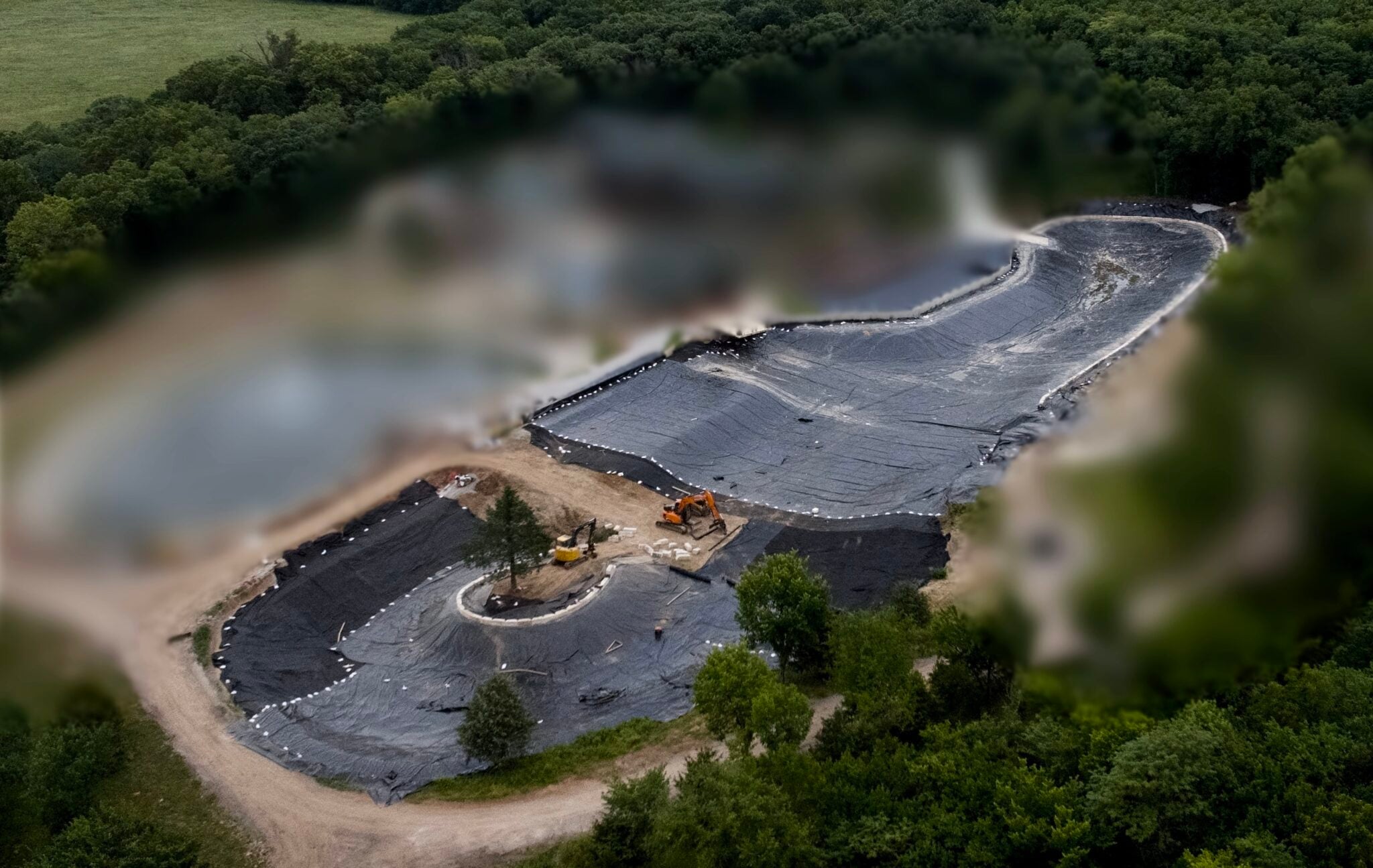 Luxury synthetic pond plastic pond liner installation in olathe kansas by bulletproof pond and lake