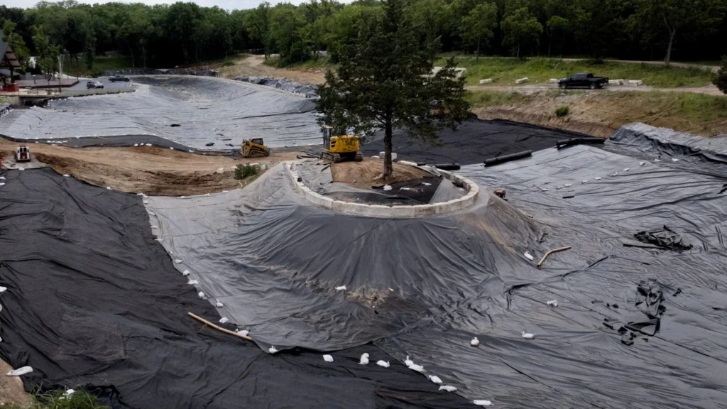Geosynthetic plastic-lined pond installed by Bulletproof Pond and Lake at a luxury waterfront resort in Olathe, Kansas